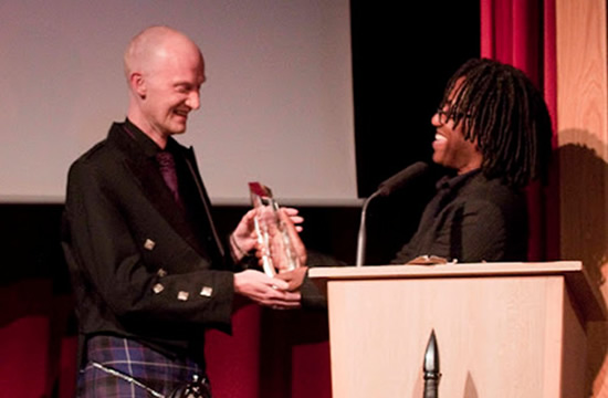 Chris Baker presents the Ravenheart Award at the 2012 Gemmell Awards