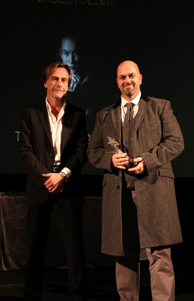 Michael Marshall Smith presents the Morningstar Award to John Gwynne at the 2013 Gemmell Awards