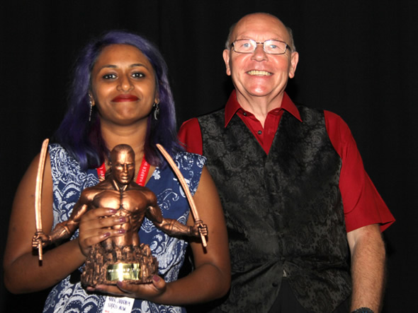 Nazia Khutan, of Orbit Books, accepted the 2018 David Gemmell Morningstar Award on behalf of Nicholas Eames. Presented by Stan Nicholls.